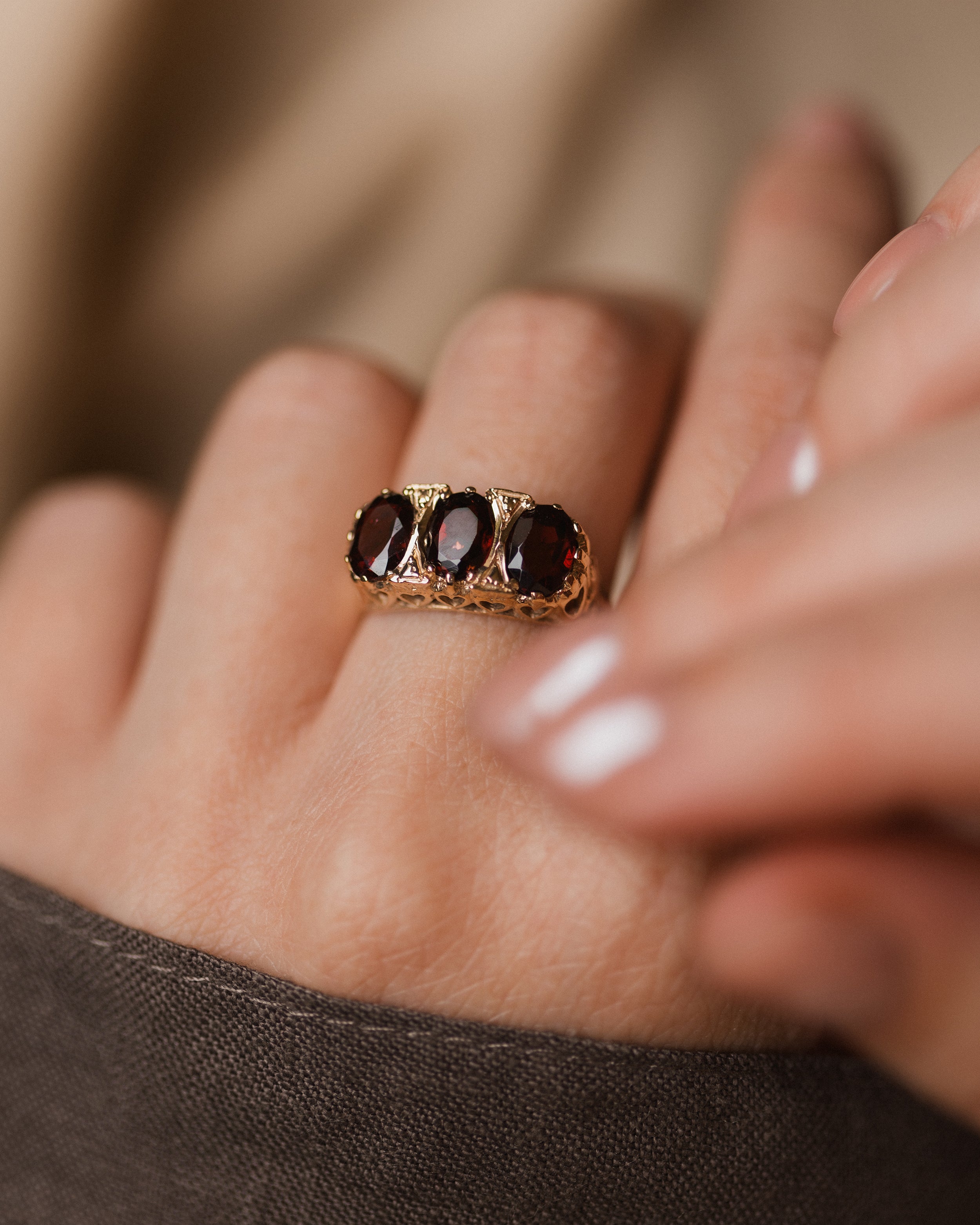 Image of Gwendolyn 1979 Vintage 9ct Gold Garnet Trilogy Ring