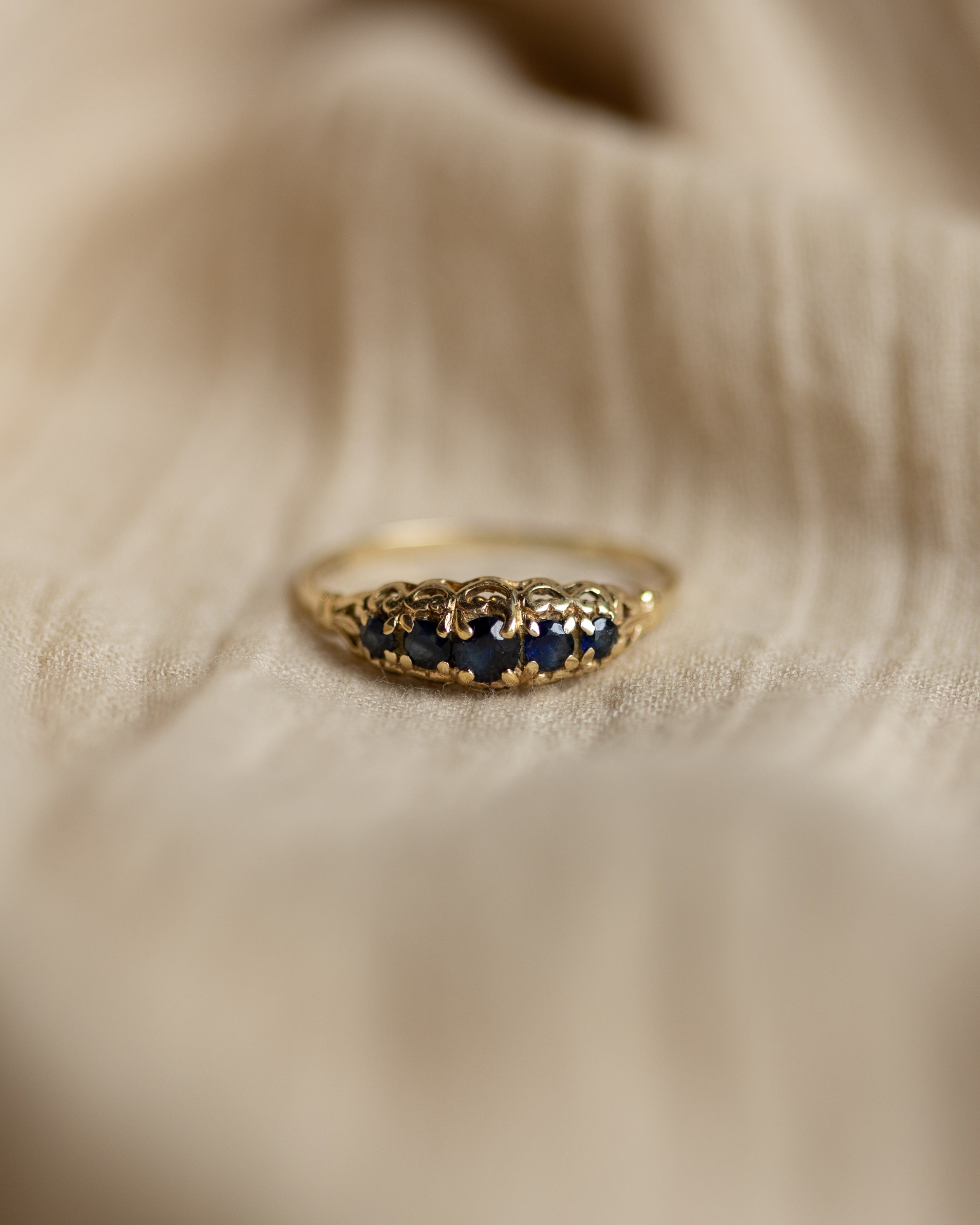 Image of Georgie 1984 Vintage 9ct Gold Sapphire Five Stone Ring