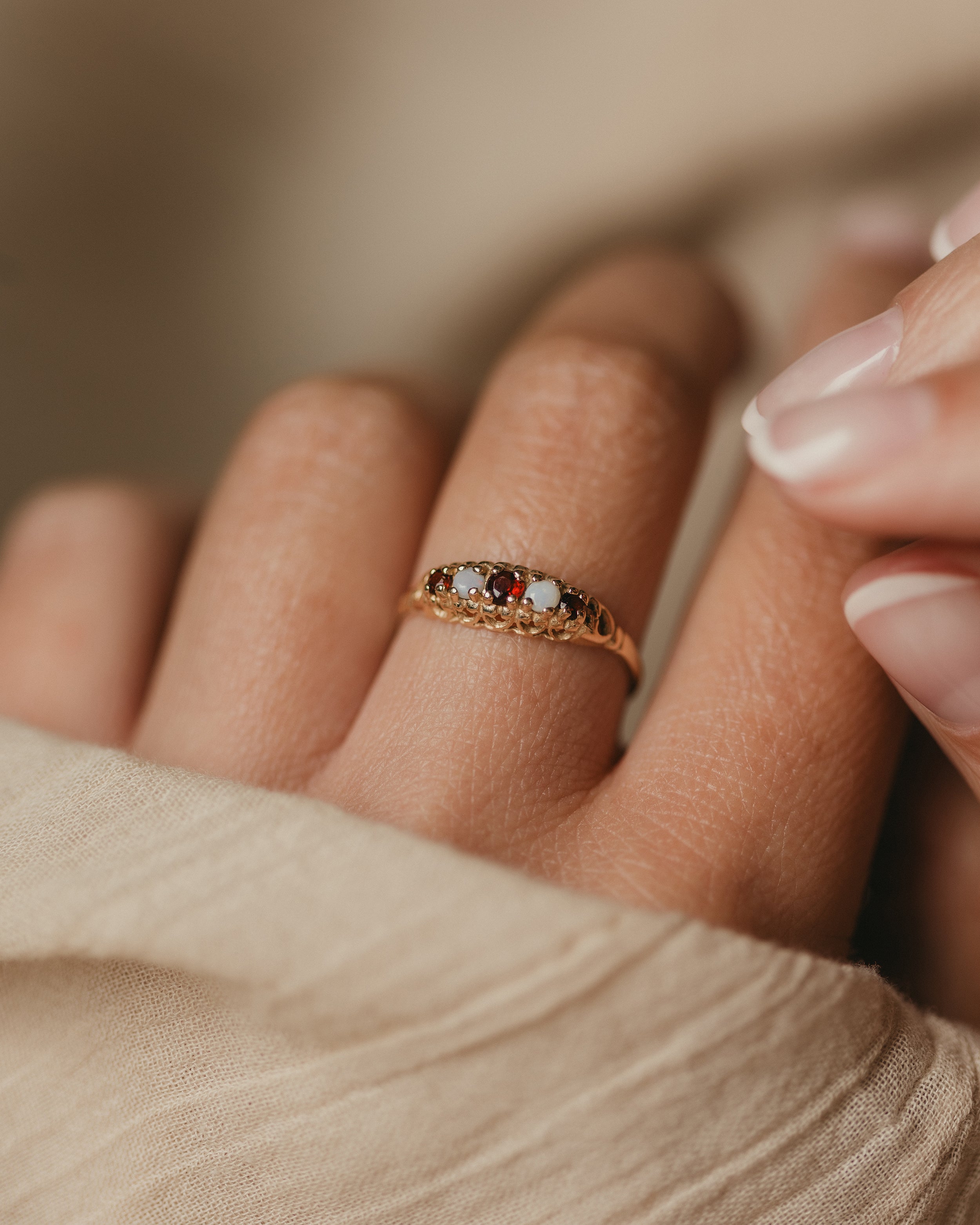 Image of Anne 1990 Vintage 9ct Gold Garnet & Opal Five Stone Ring