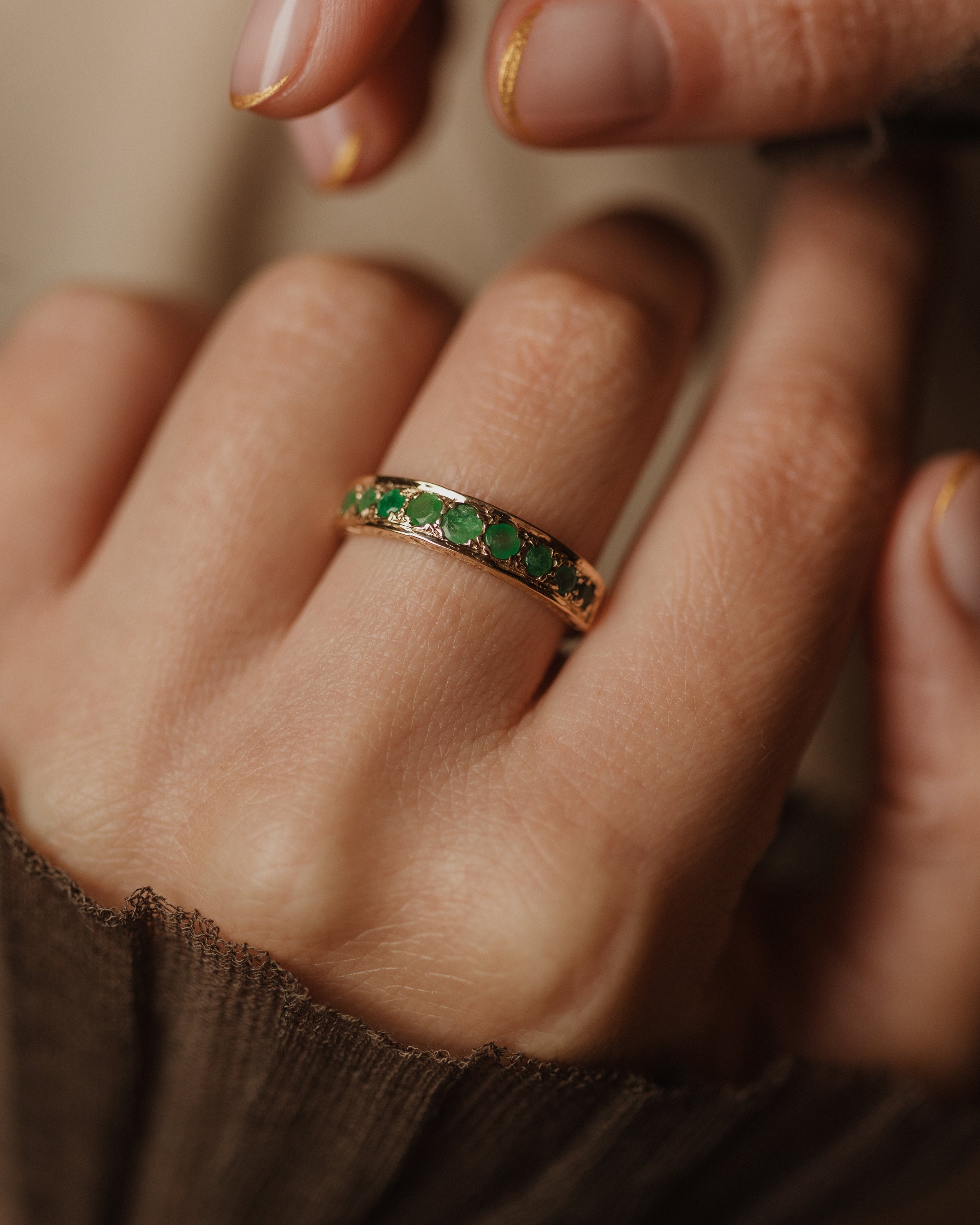 Image of Solana 1978 Vintage 9ct Gold Emerald Half Eternity Ring