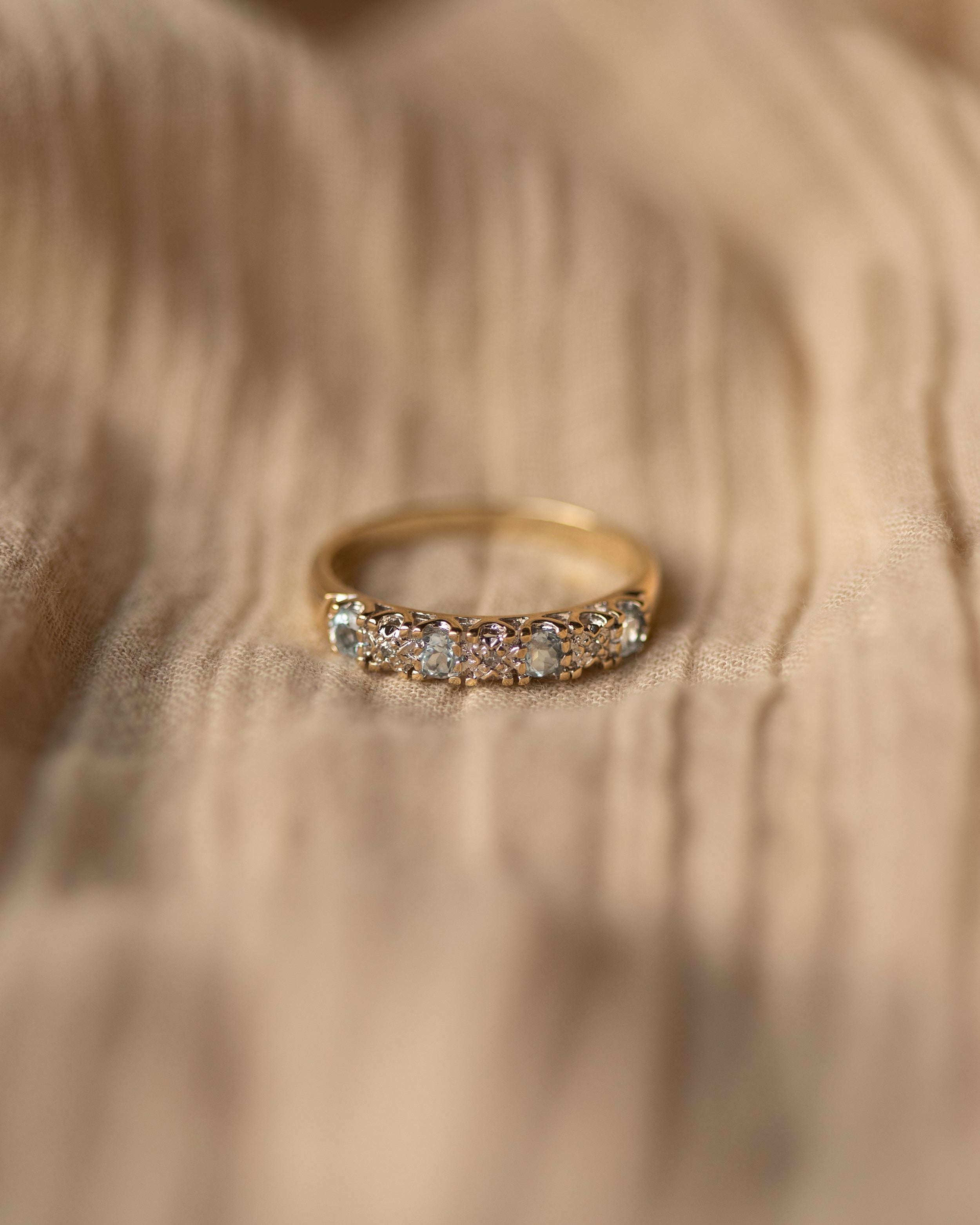 Image of Carmen Vintage 9ct Gold Blue Topaz & Diamond Half Eternity Ring