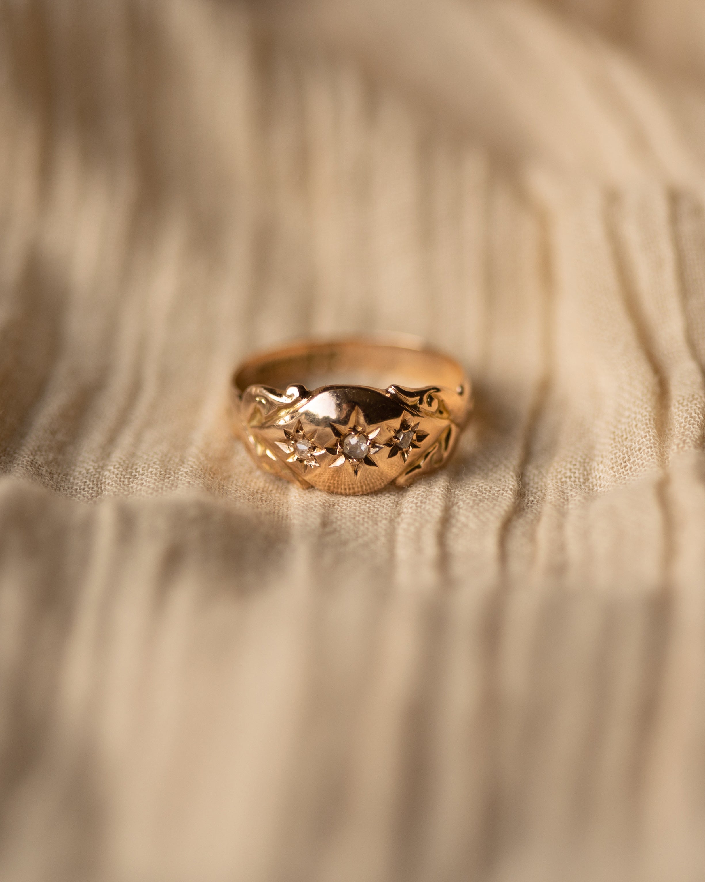 Image of Winnie 1918 Antique 9ct Gold Star Set Diamond Trilogy Ring