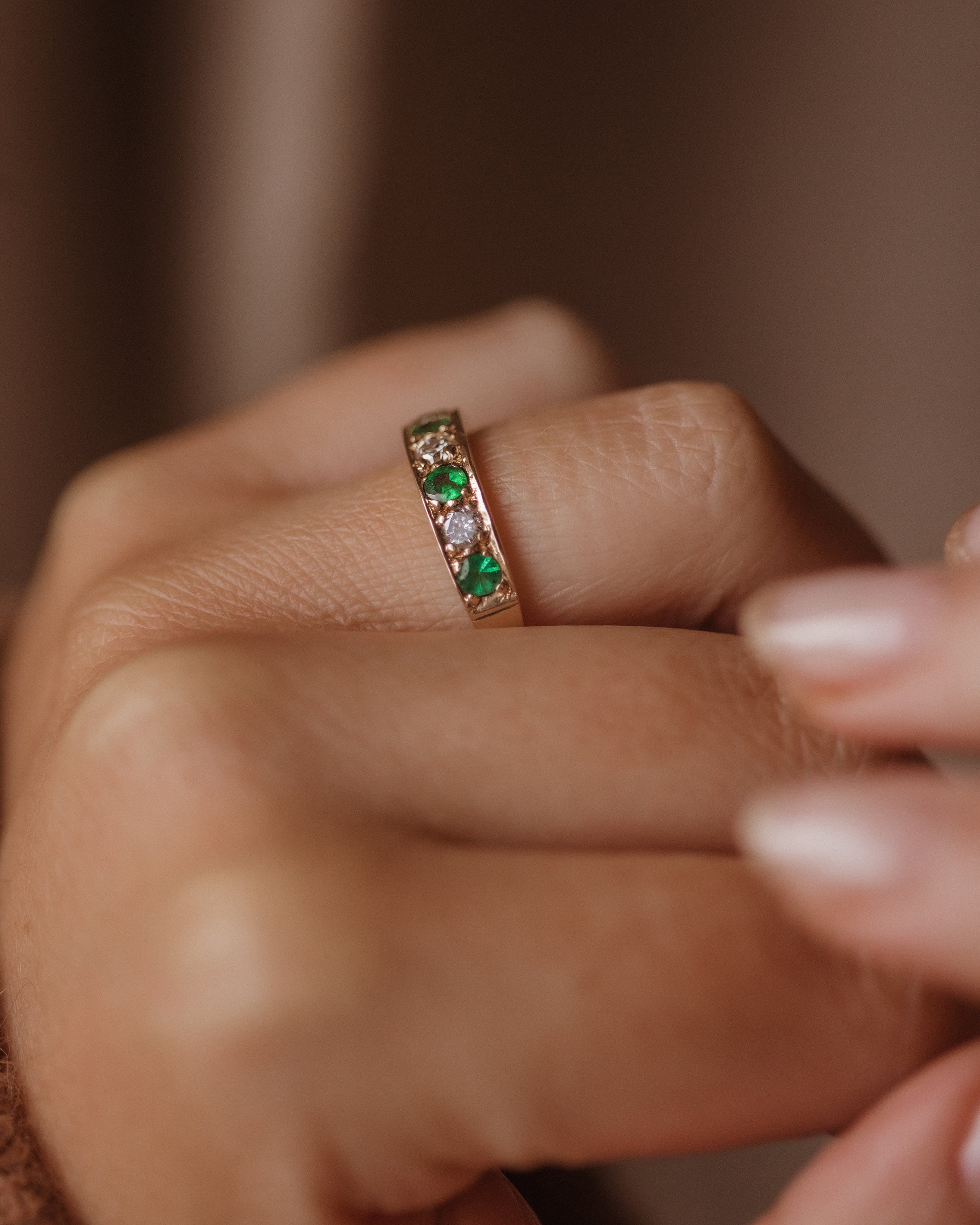 Image of Augusta 1988 Vintage 9ct Gold Emerald & Diamond Half Eternity Ring