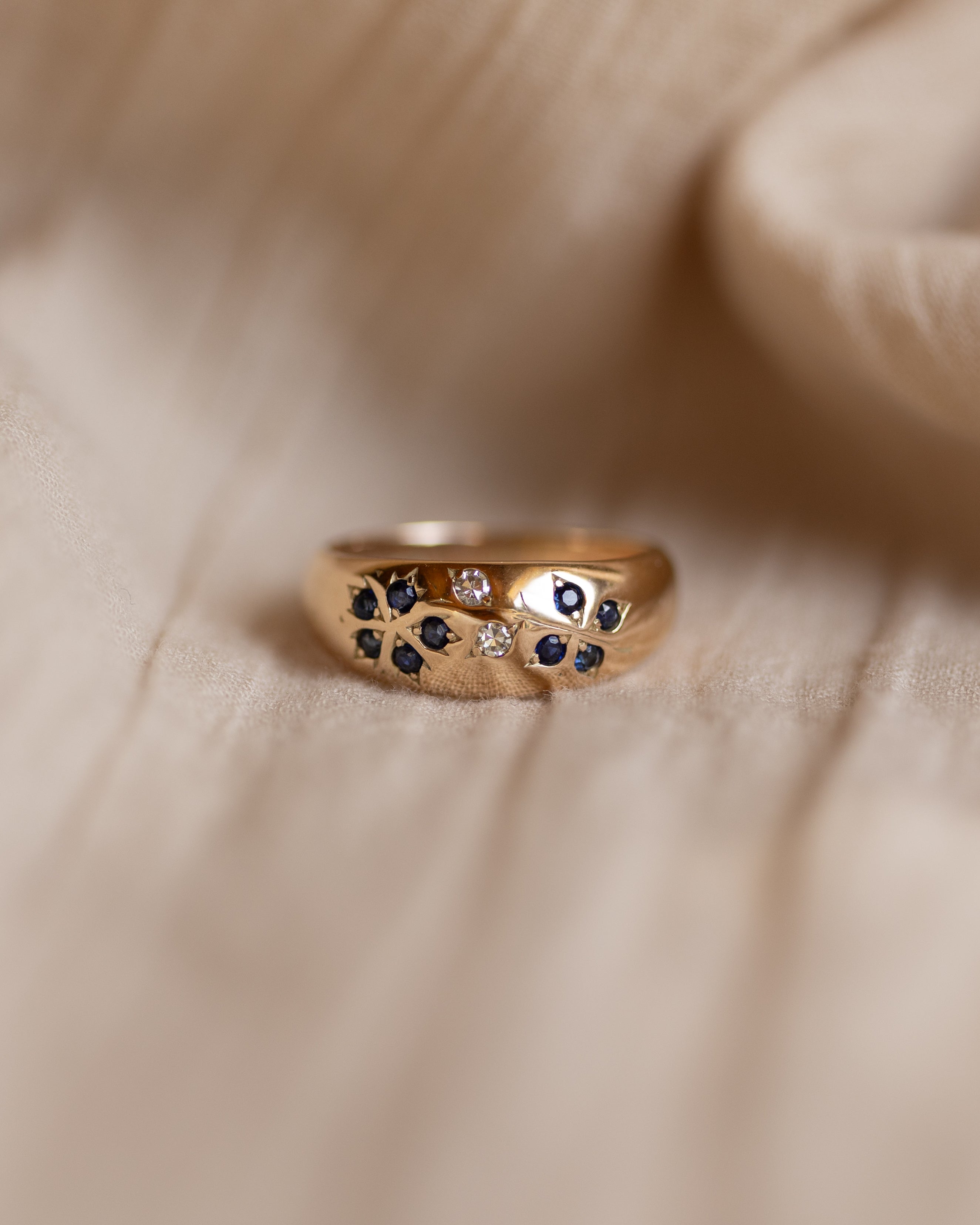 Image of Perrine 1988 Vintage 9ct Gold Sapphire & Diamond Rubover Ring