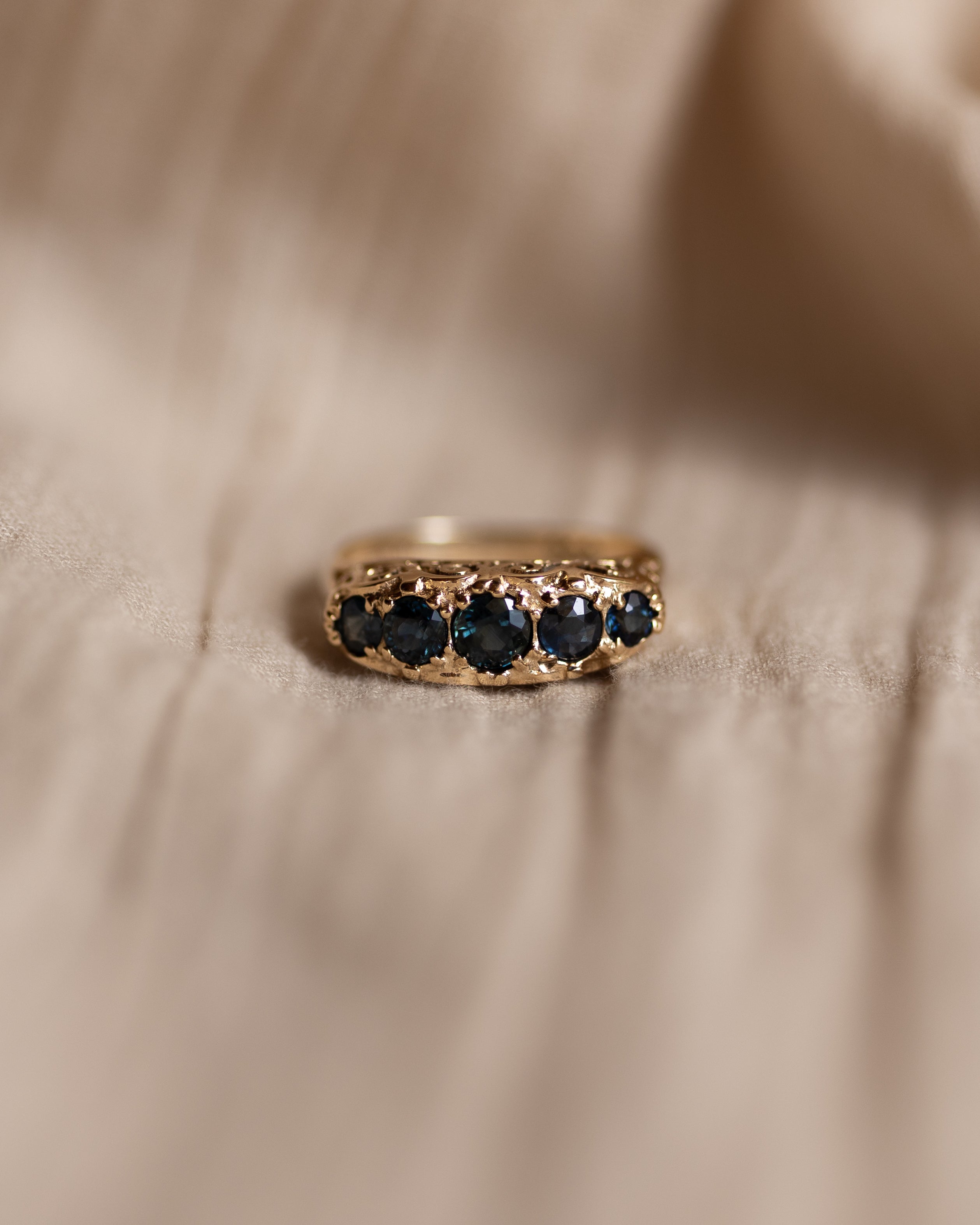 Image of Henrietta 1978 Vintage 9ct Gold Blue Topaz Five Stone Ring