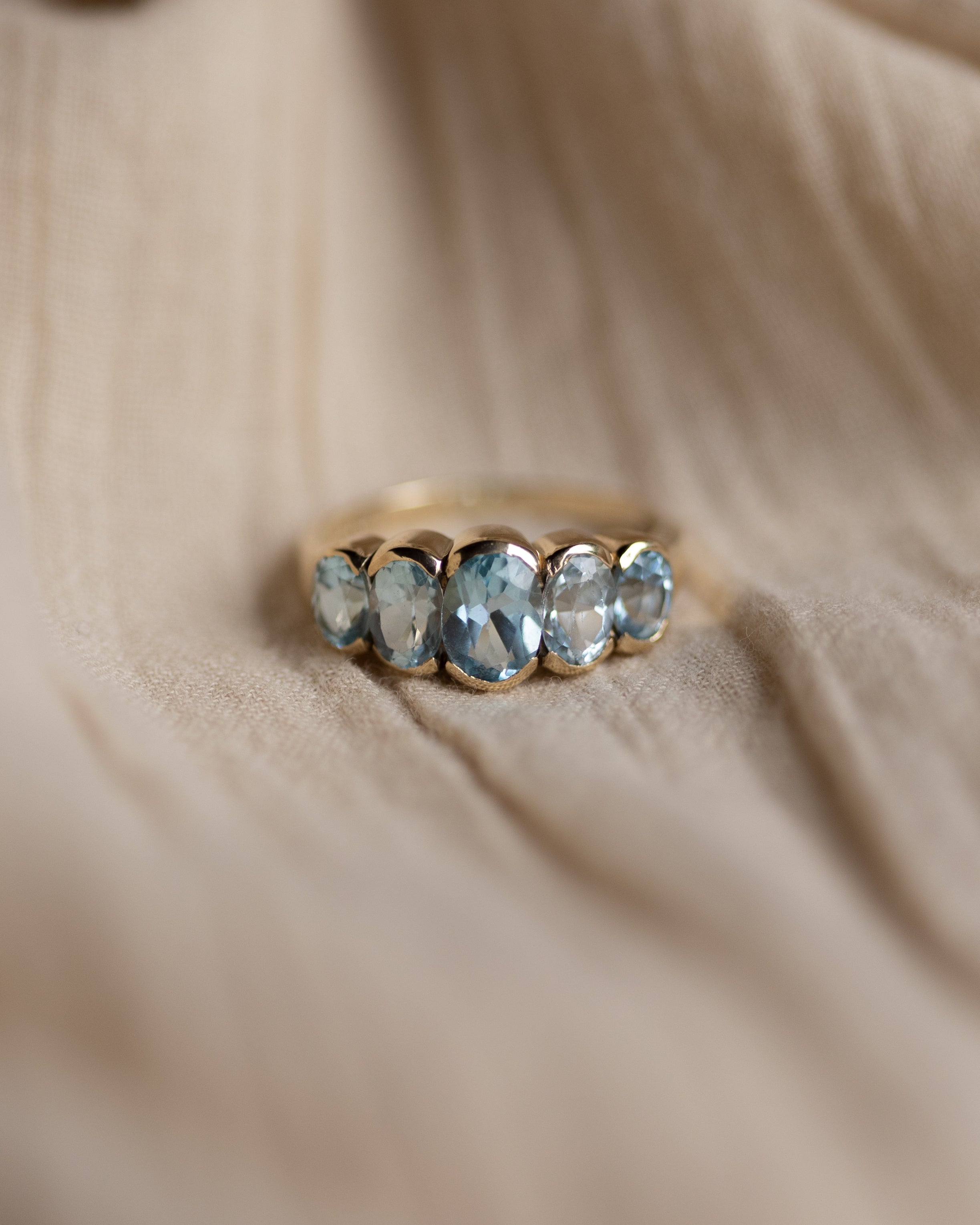 Image of Stella Vintage 9ct Gold Blue Topaz Five Stone Ring